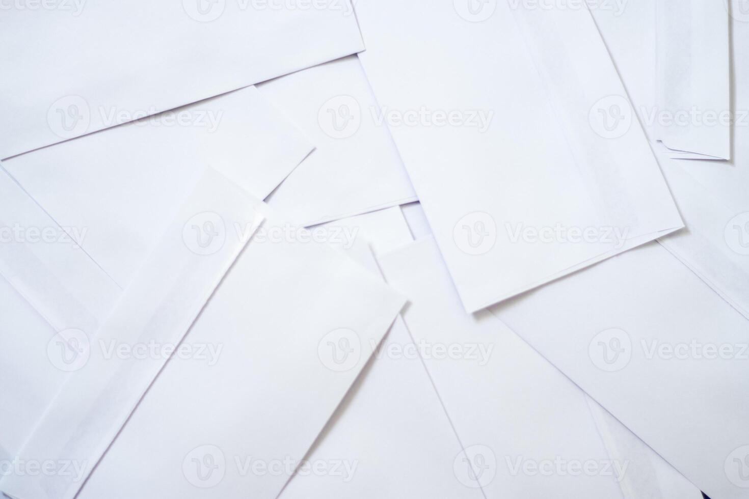 stack of Blank White Envelope Mockup with Invitation Cards photo