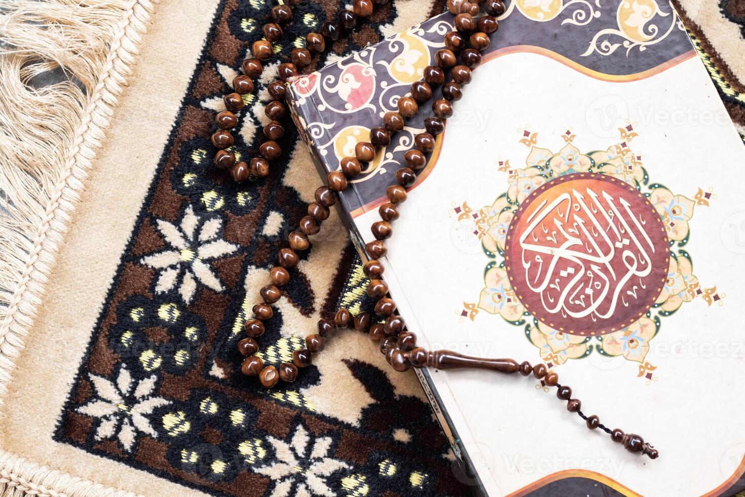 Islamic or Ramadan concept photo. Al-Qur'an on the pulpit in top view. The concept of candlesticks or laylat al-qadr. photo