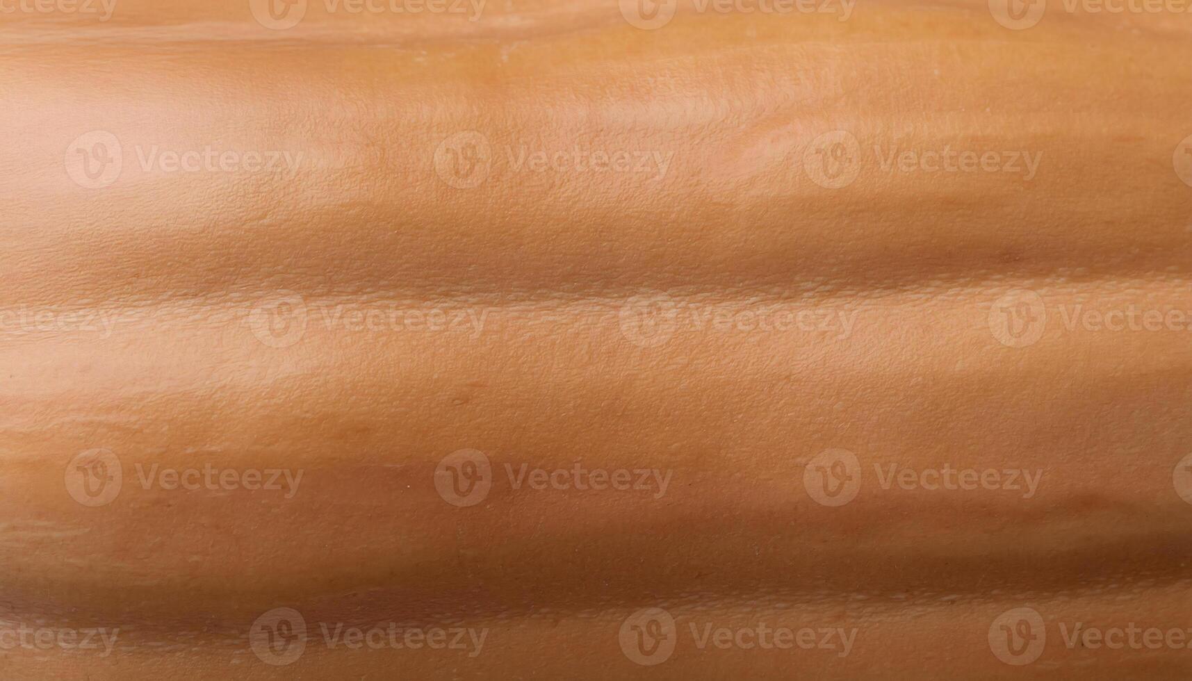 macro close-up of butternut squash peel with smooth pale beige surface and subtle texture photo