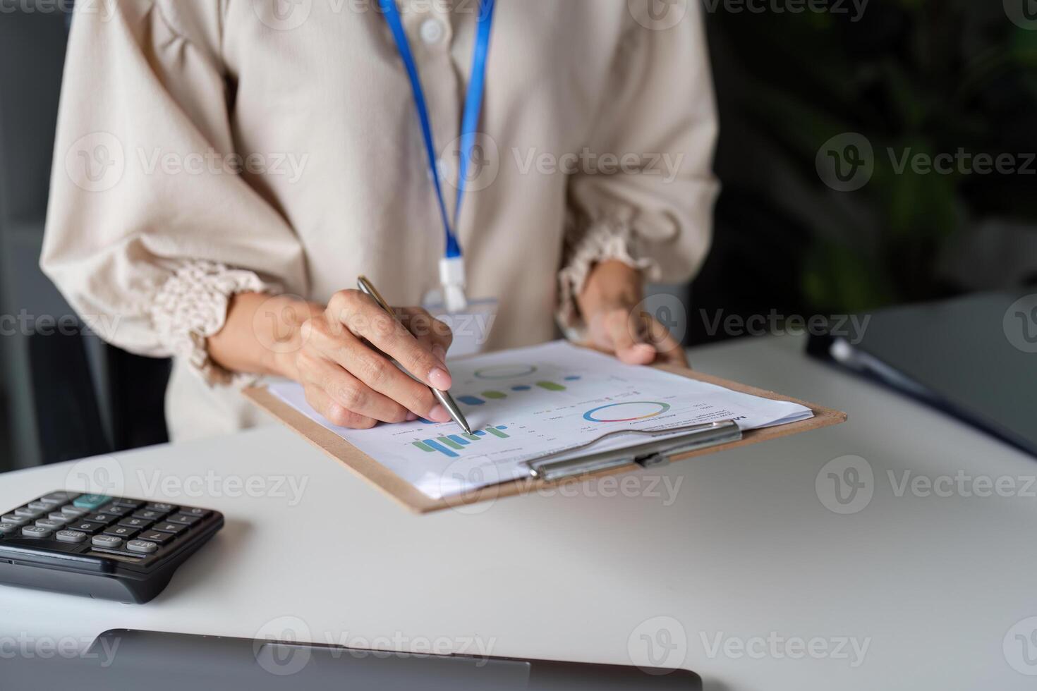 Professional Workspace with Documents and Charts on Table for Business Analysis and Planning photo