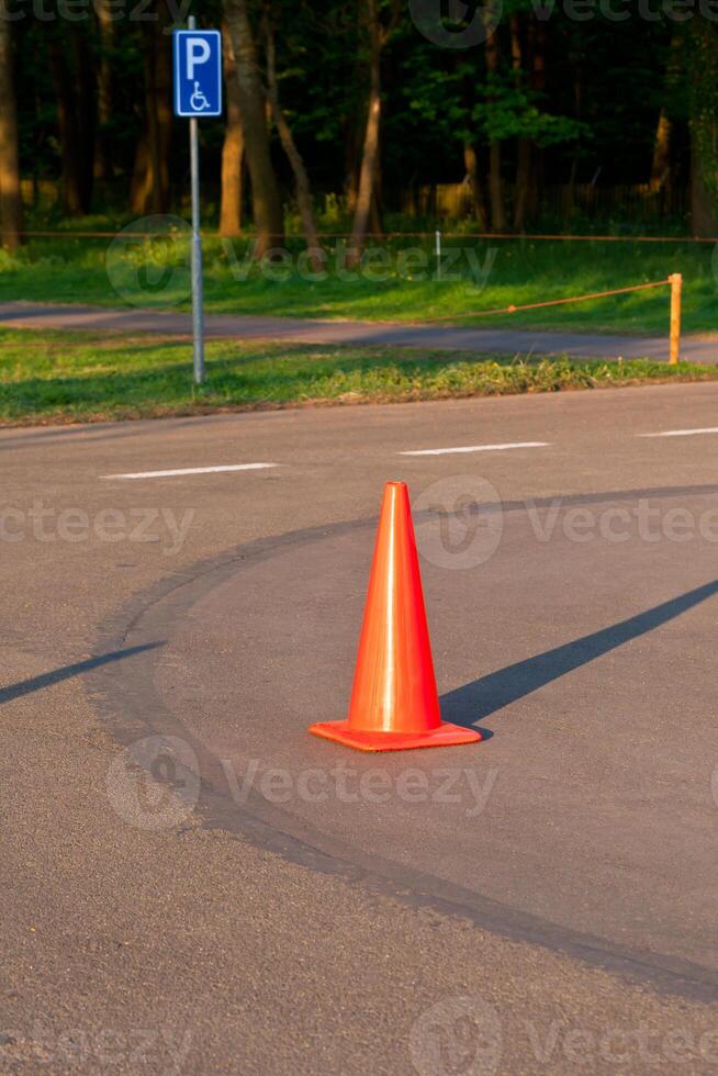 Traffic cone on the parking photo