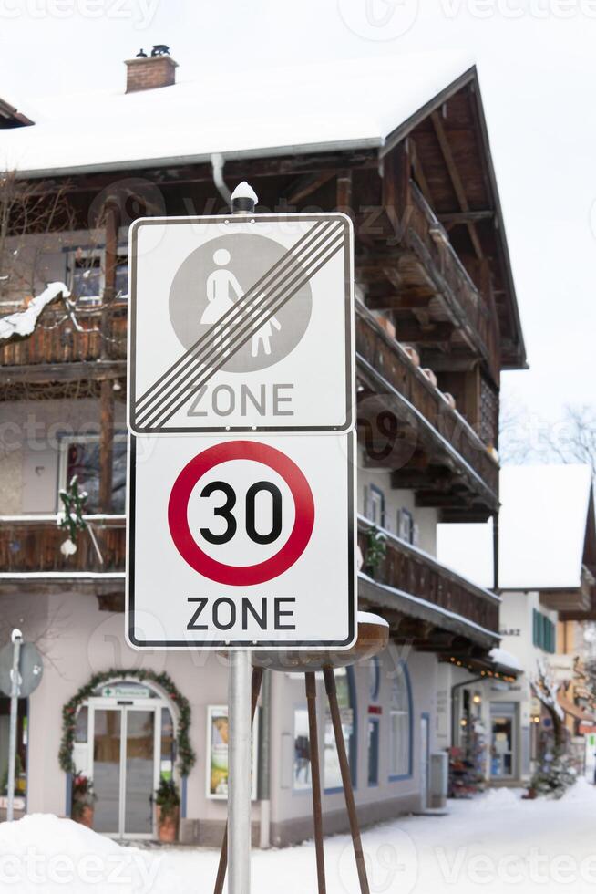 Speed limit road sign in a town photo