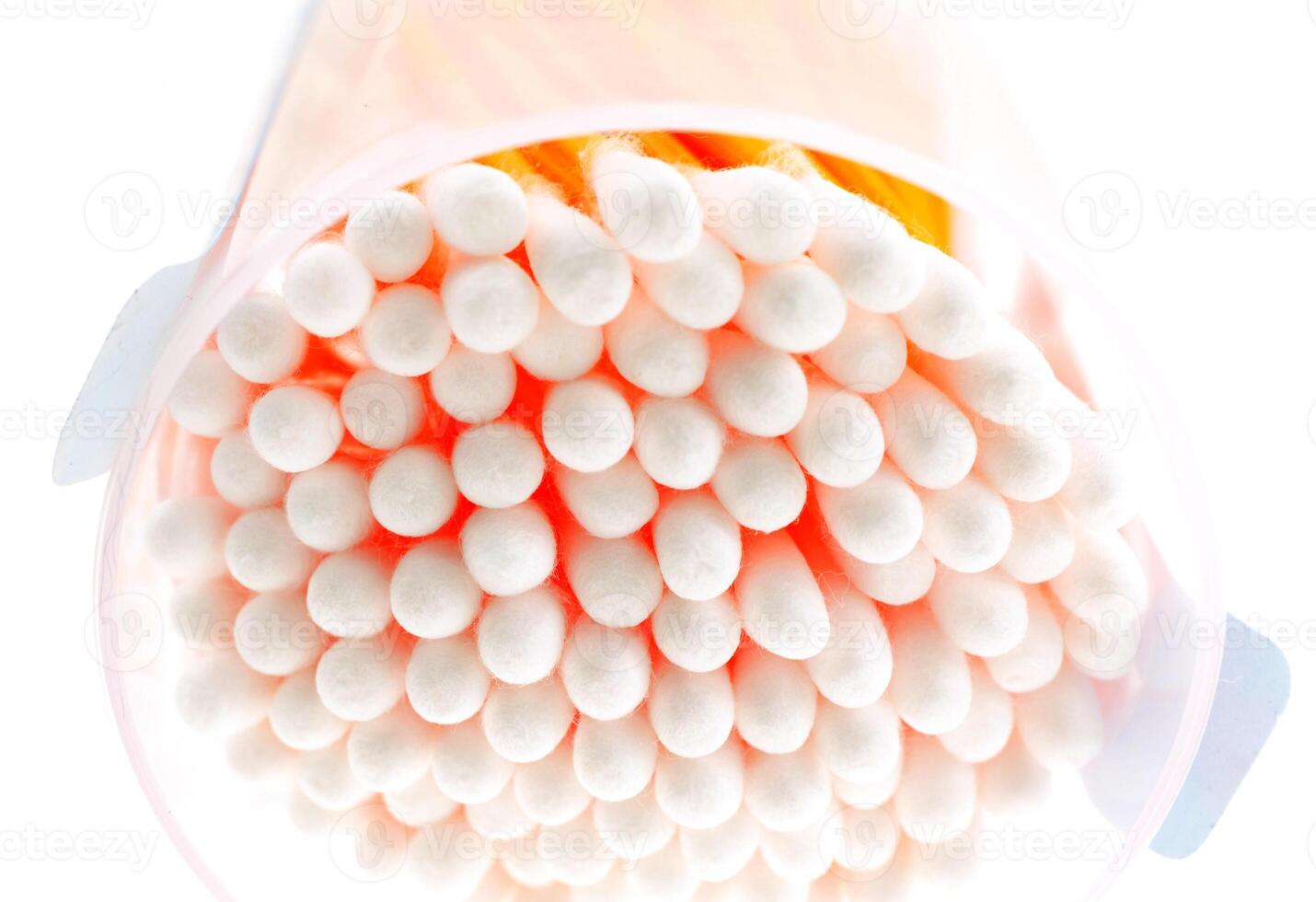 cotton buds in transparent plastic box photo