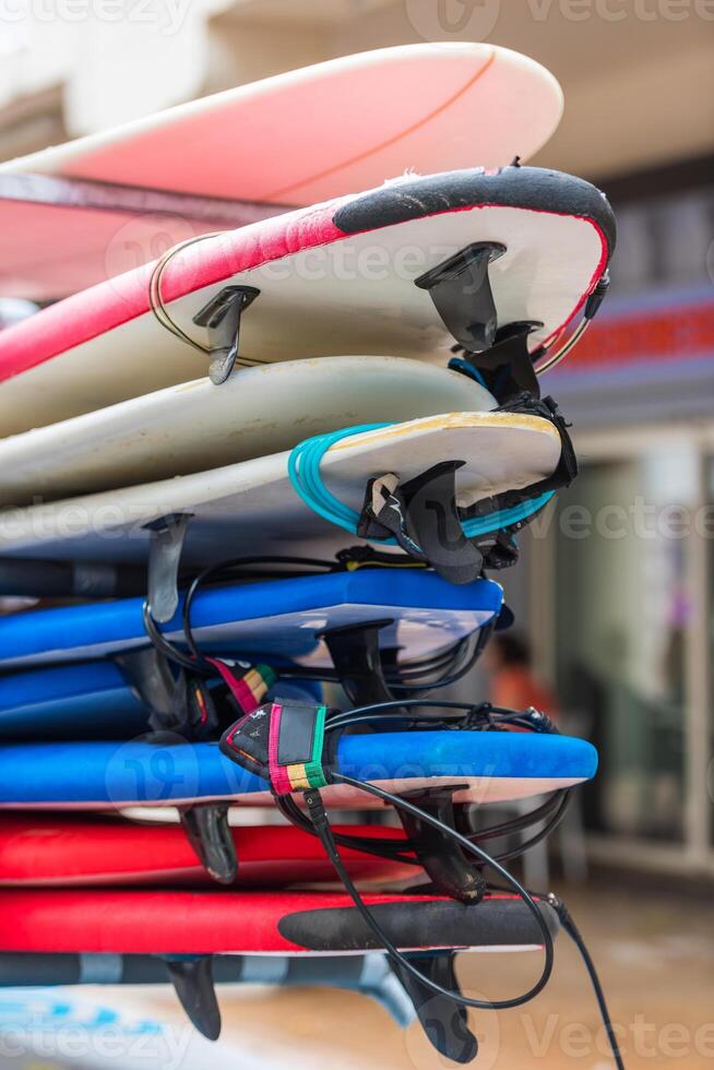 Surf boards in a stack photo