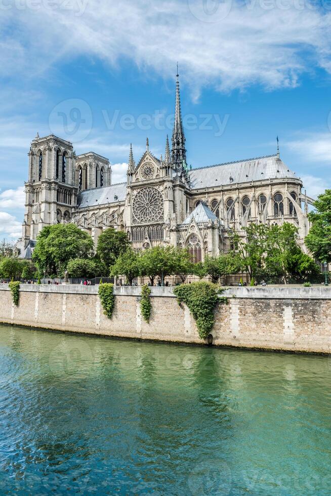 Cathedral of Notre Dame in Paris and the Seine river photo