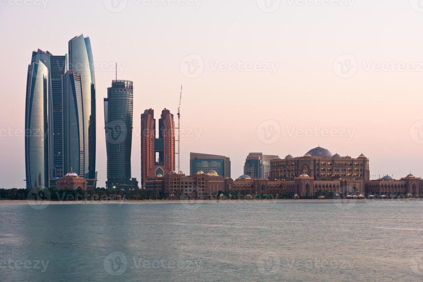 Abu Dhabi buildings skyline from the sea photo