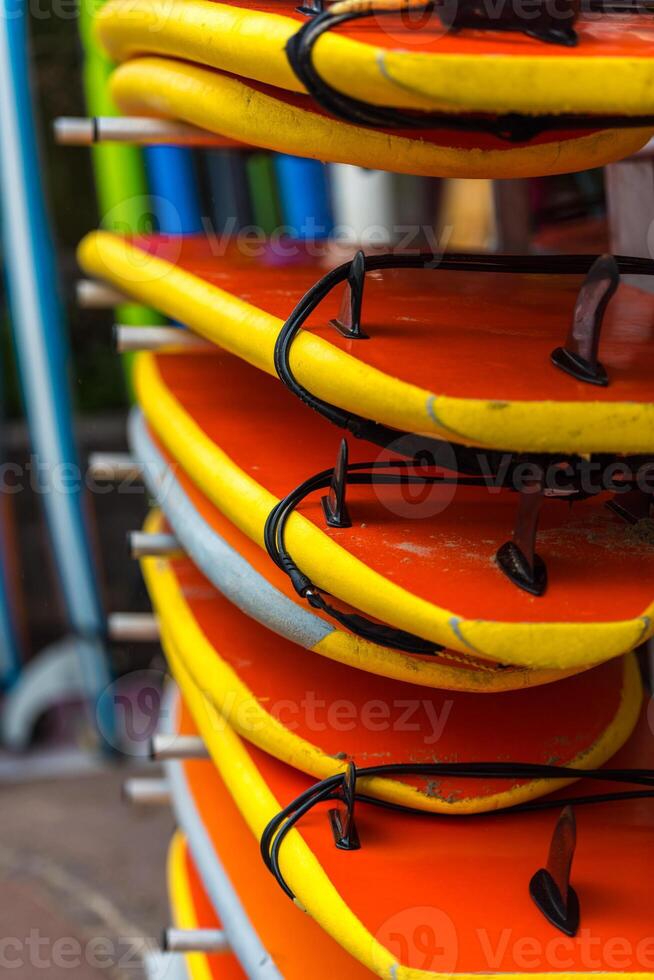 Surf boards in a stack photo