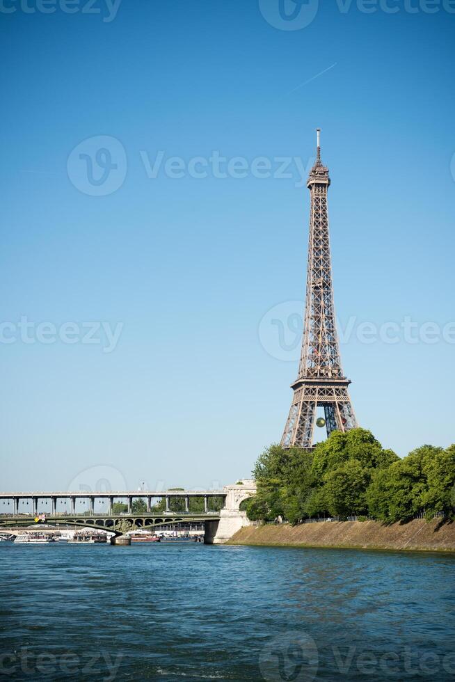 The Eiffel tower and the Seine river photo