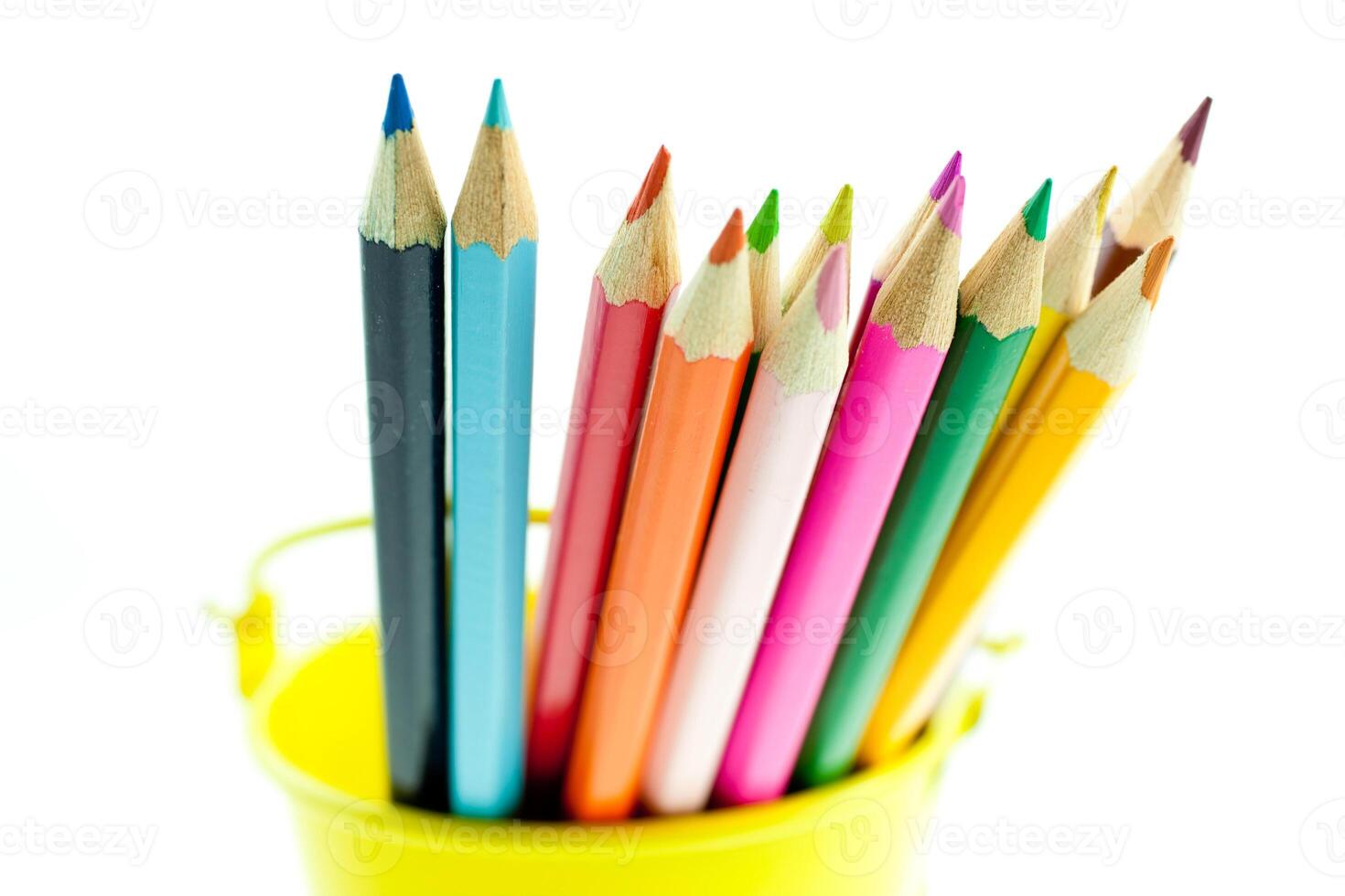 crayons in yellow bucket photo
