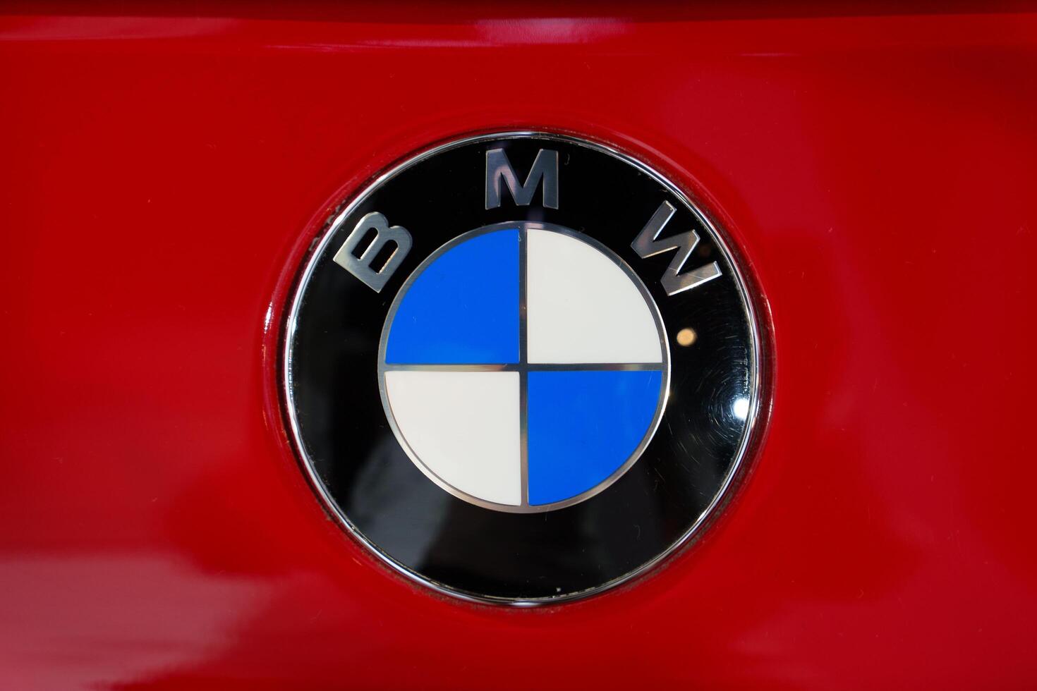 Munich, Germany, 16.07.2024 - The logo of BMW, founded in 1916 by Franz Josef Popp, represents a luxury vehicle manufacturer renowned for its quality and innovation in the automotive industry. photo