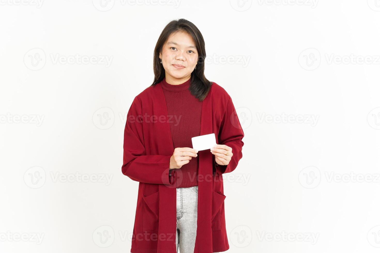 Holding and Showing Blank Credit Card Of Beautiful Asian Woman Wearing Red Shirt Isolated On White photo
