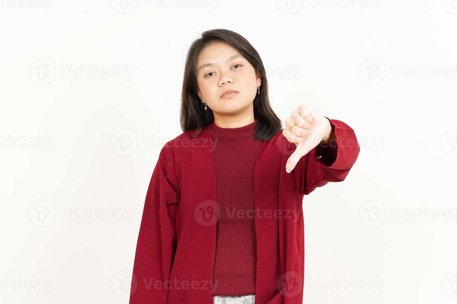 Pointing Down Of Beautiful Asian Woman Wearing Red Shirt Isolated On White Background photo