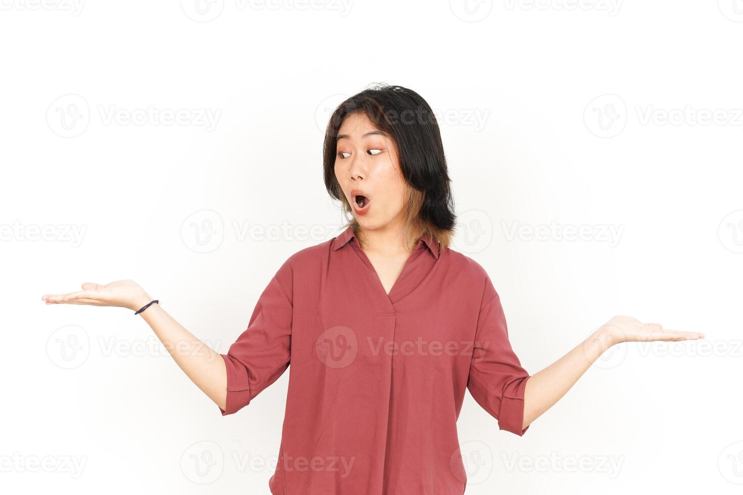 Showing and Presenting Two Product on Open Palm Of Beautiful Asian Woman Isolated On White Background photo