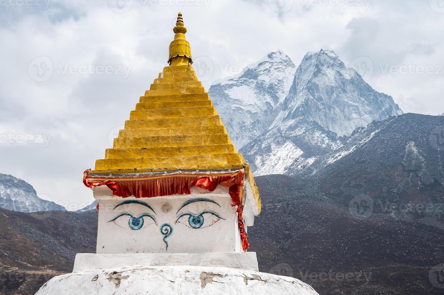 Ancient Tibetan Buddhist stupa with beautiful view of Mt.Ama Dablam located in Dingboche village Nepal. photo