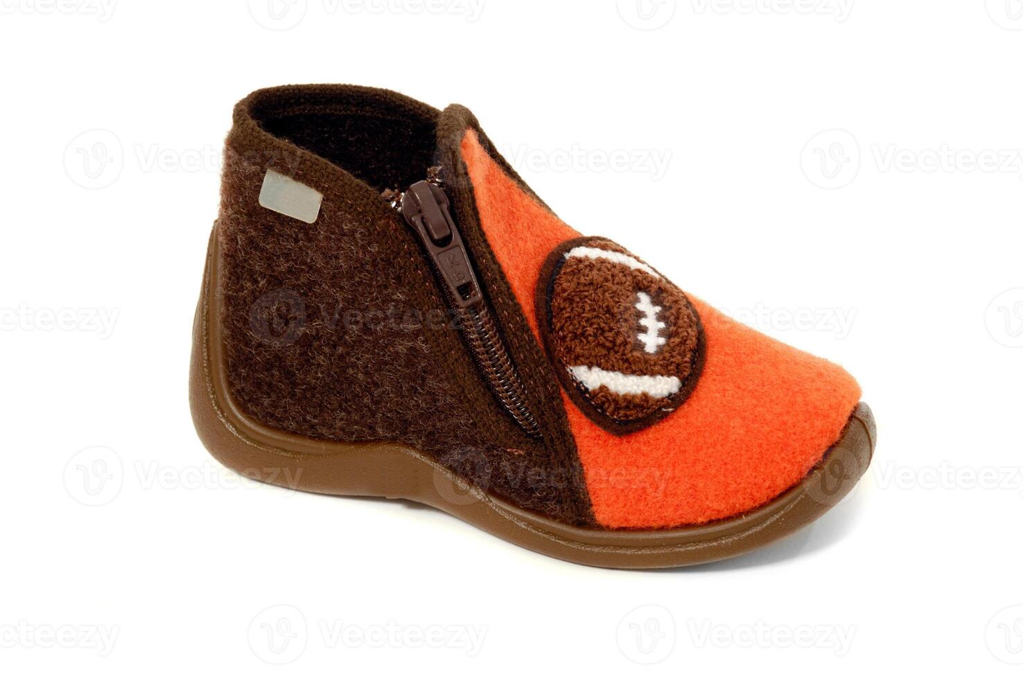 Baby shoe on a white background photo