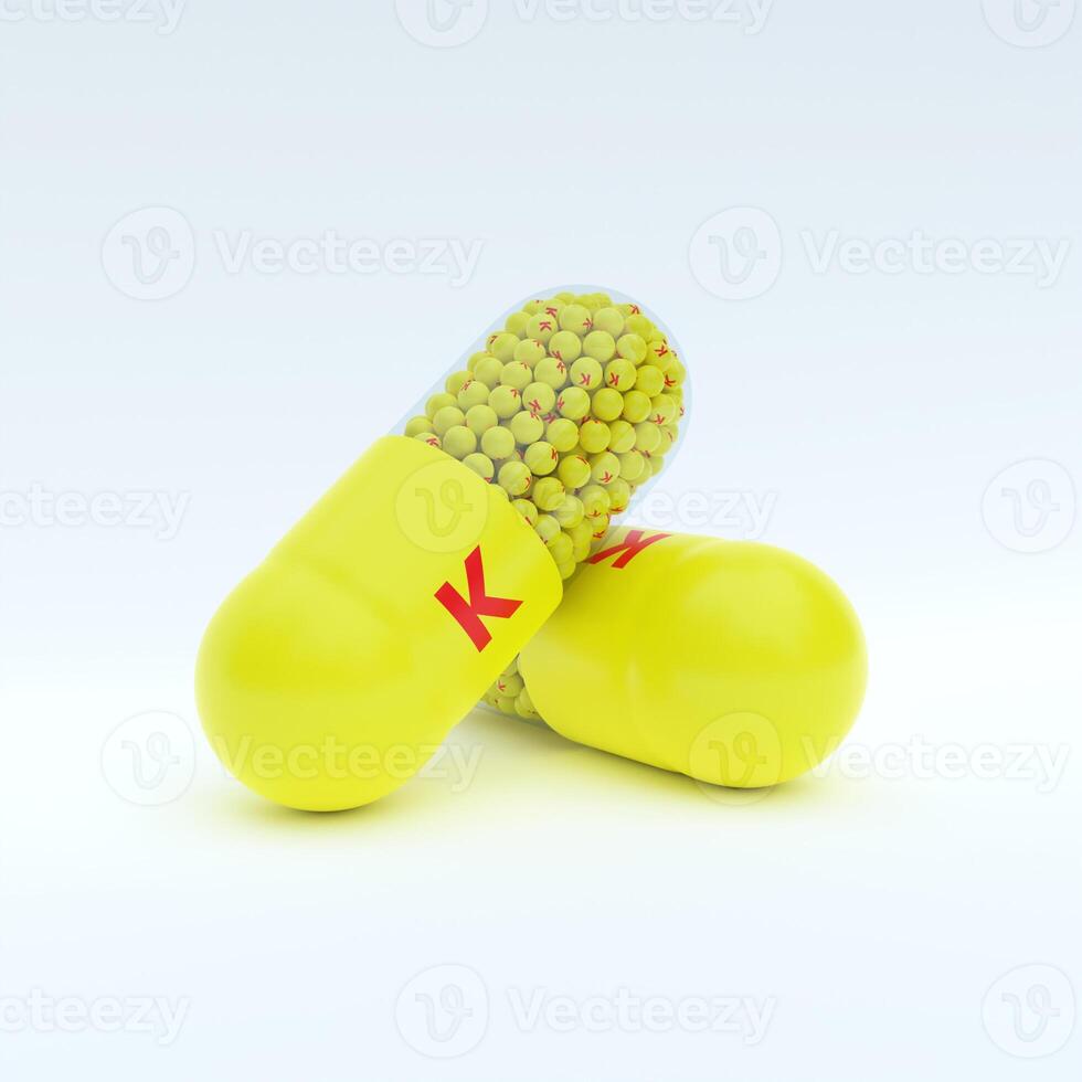 Vitamin K With Yellow Capsule, Granules and White Background photo