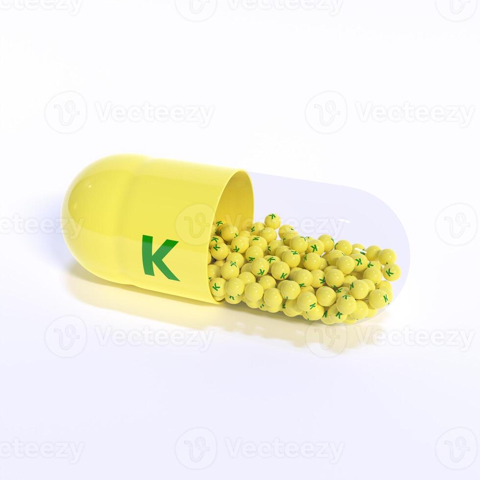 Vitamin K With Yellow Capsule, Granules and White Background photo
