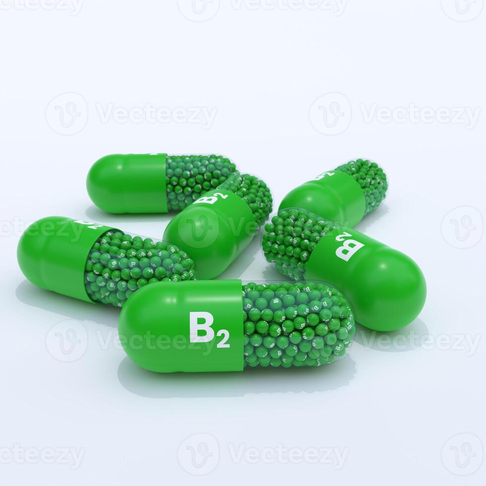 Vitamin B2 With Green Capsules, Granules and White Background photo