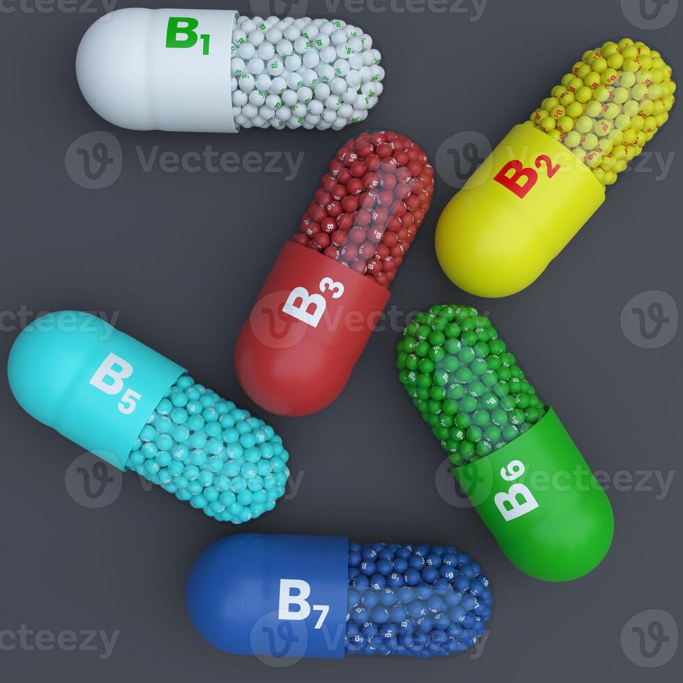 VitaminB1,B2,B3,B5,B6,B7 With Green, White,Yellow,Red,Blue and Turqoise Capsules, Granules and Dark Background photo
