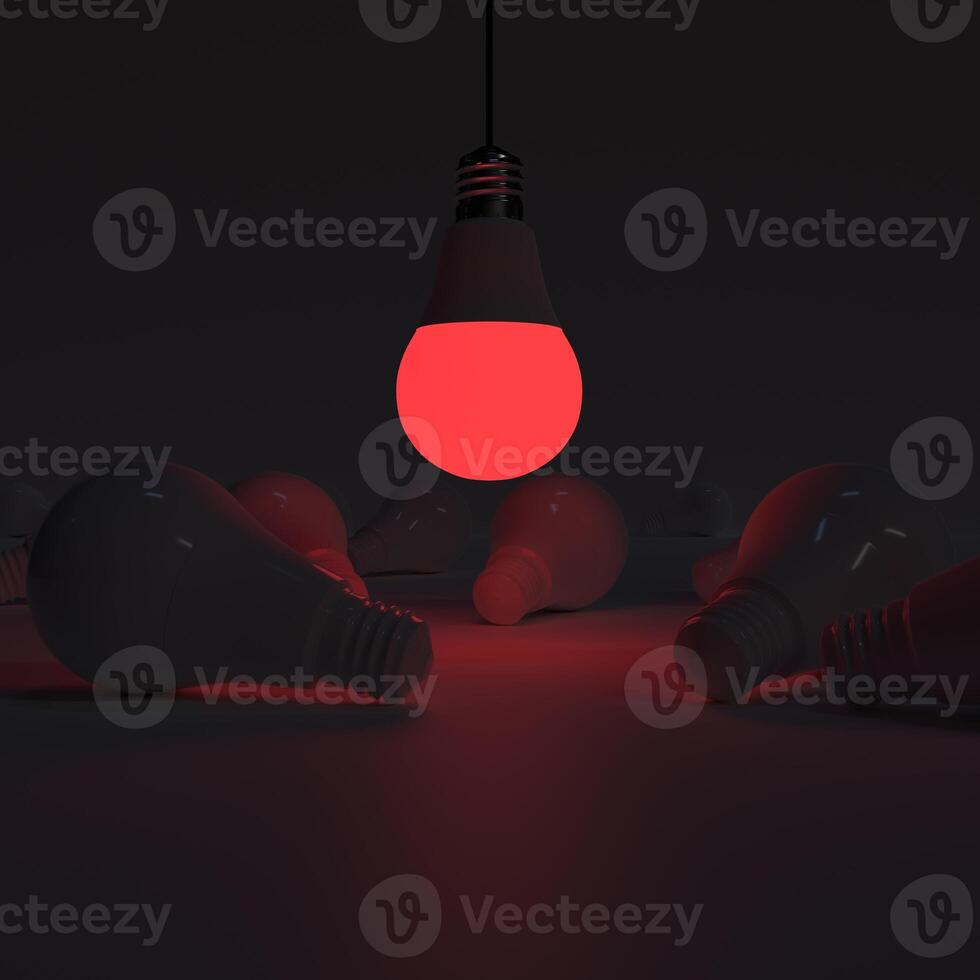 One of Lightbulb glowing among shutdown light bulb red photo