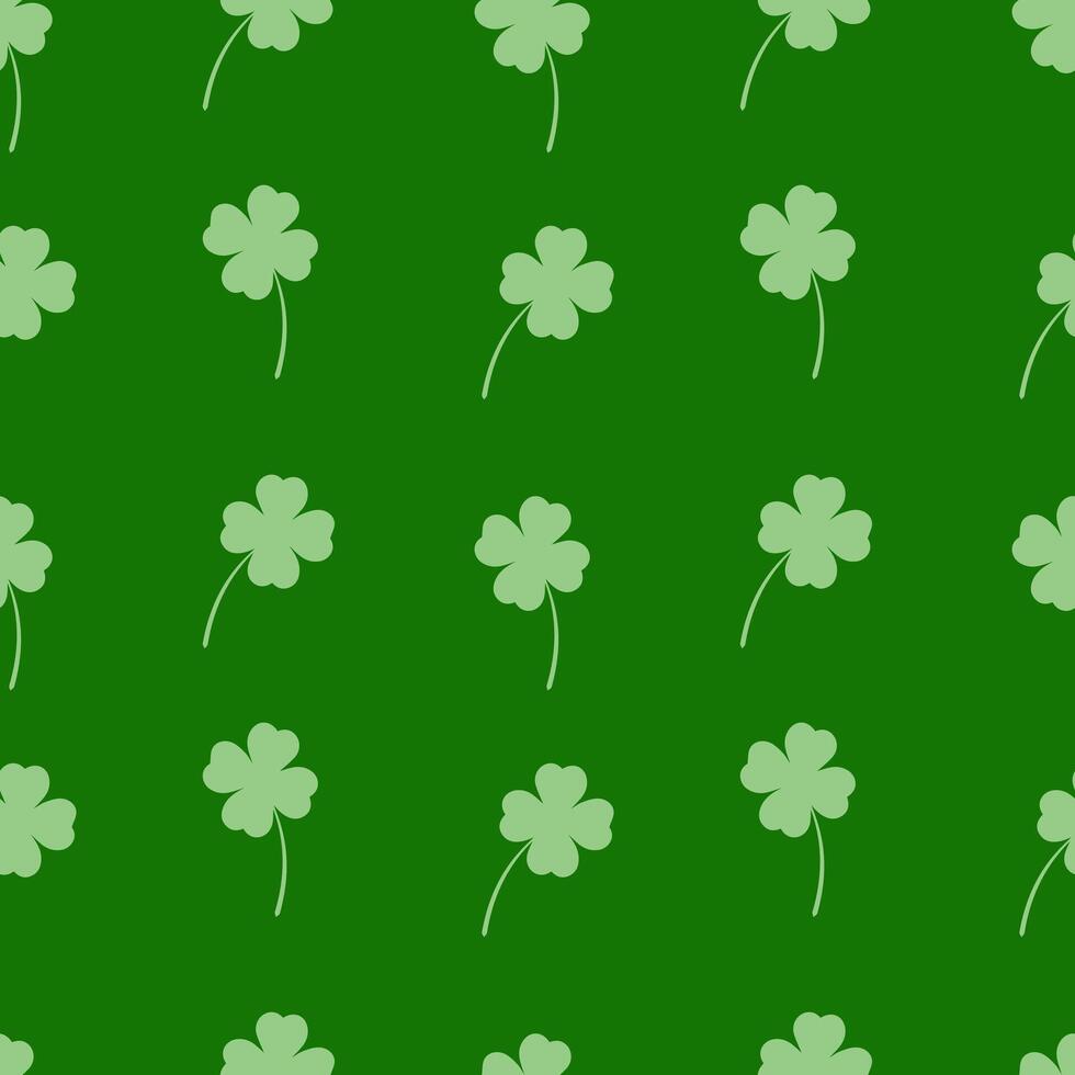 Seamless pattern with clover leaves on a green background vector