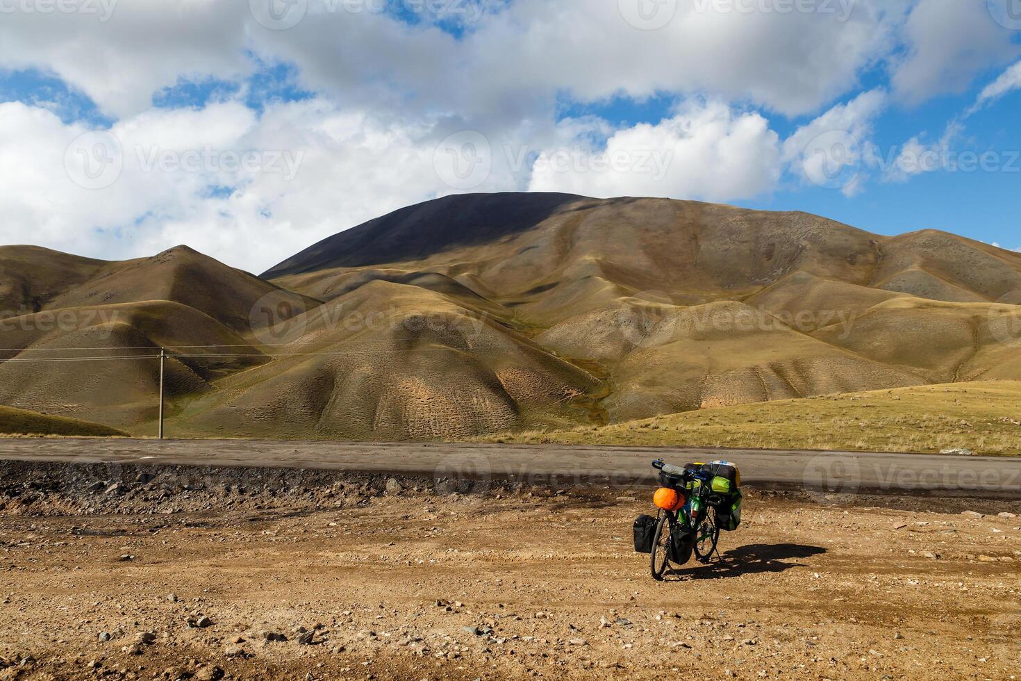 bicycle with bags, landscape, Kyrgyzstan photo