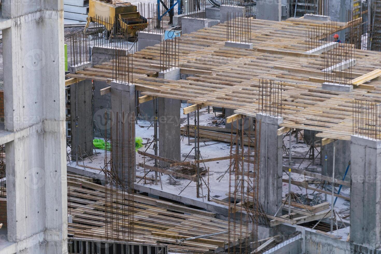 Construction workers working on Construction machine. Aerial platform for workers who work at height on buildings. photo