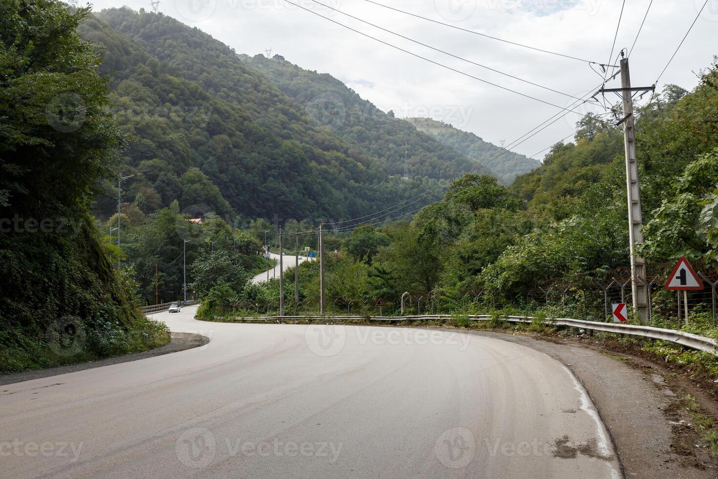 Curvy road near the border between Iran and Azerbaijan in a mountainous landscape photo