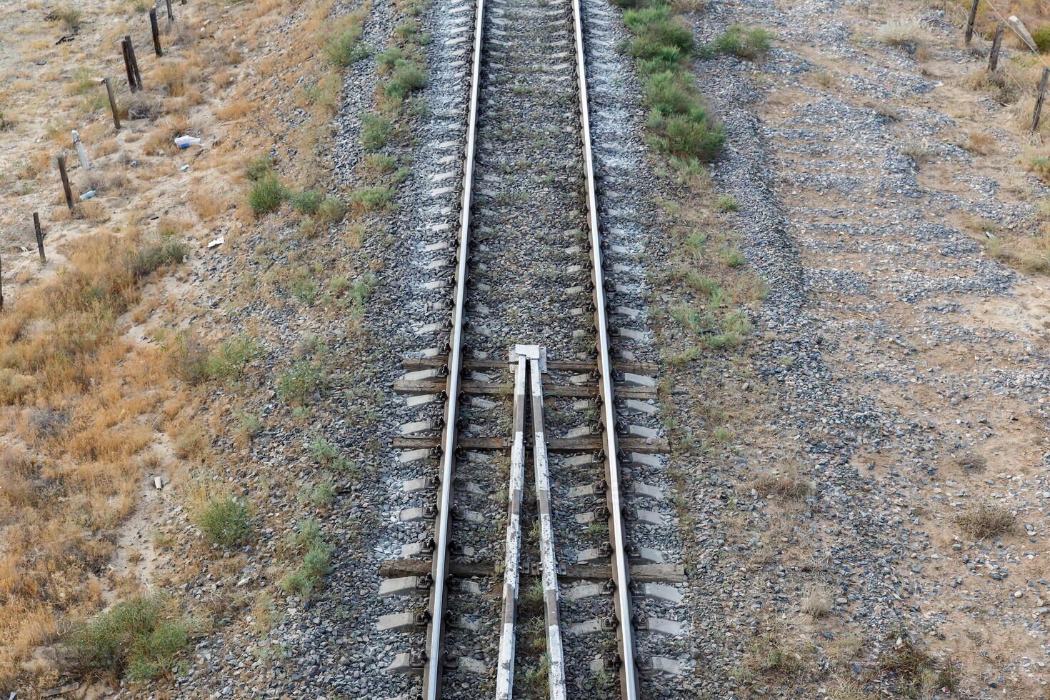 The railway in steppe of Kazakhstan photo