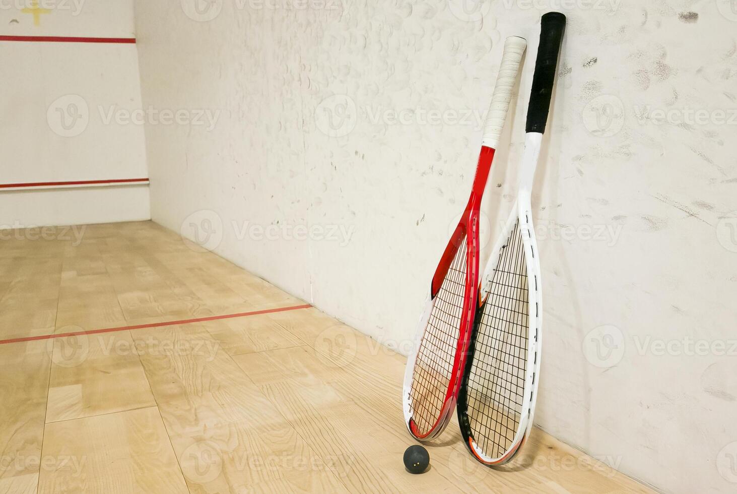 Sports, above and racket on squash court for competition, challenge and training center. Exercise, interior and empty room with top view of wooden floor of gymnasium for games, fitness club and gear photo