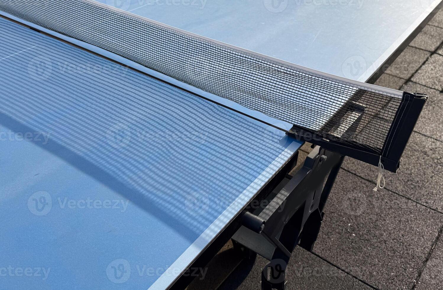 ping-pong table with a net photo
