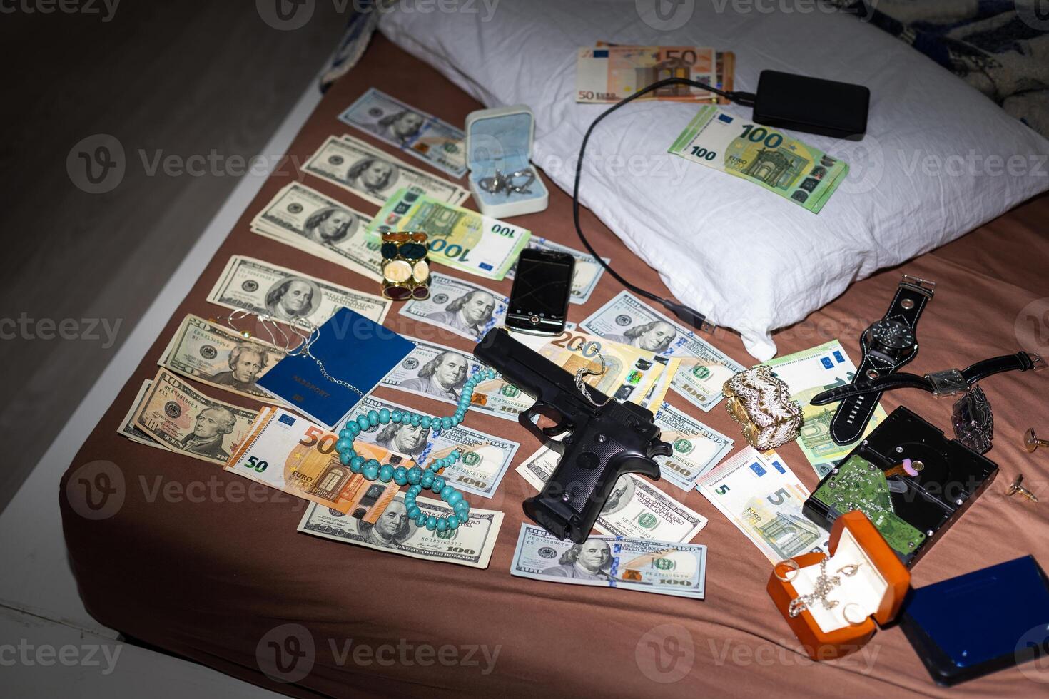 wallet with money out of a murder evidence bag, conceptual image photo
