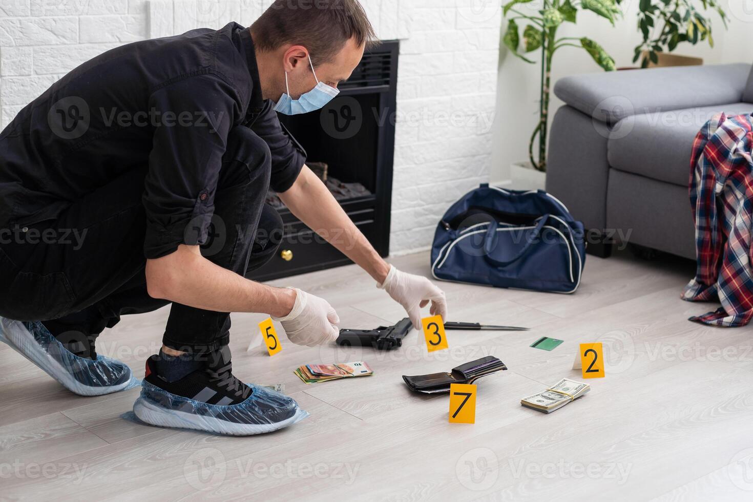 Forensics researcher photographing a blood at a murder scene photo