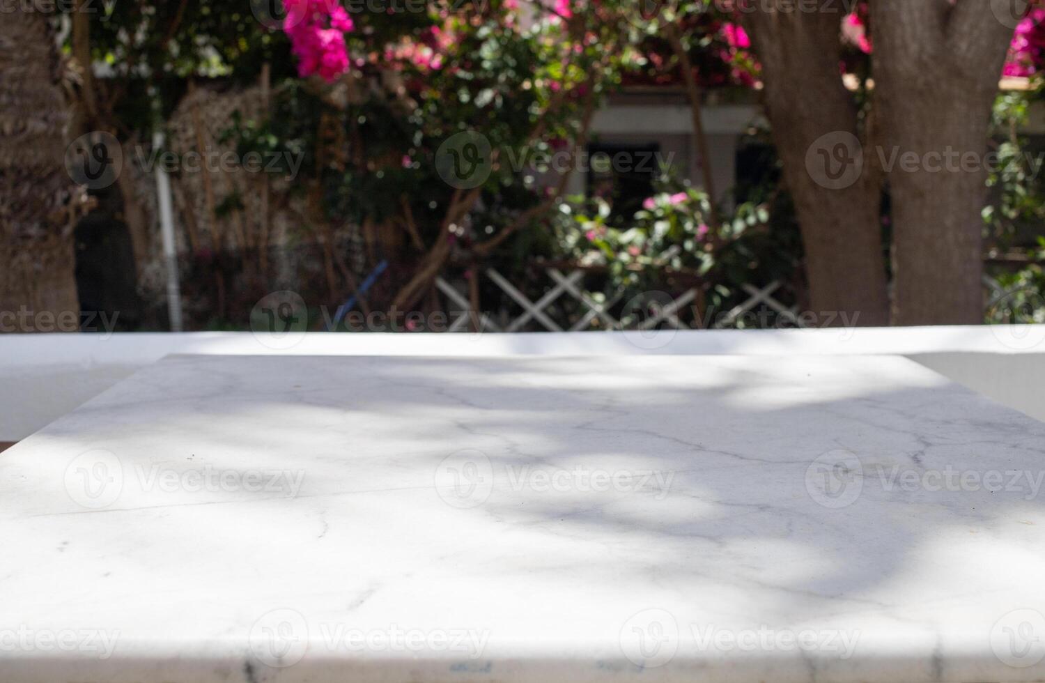 marble tabletop on sunny terrace photo