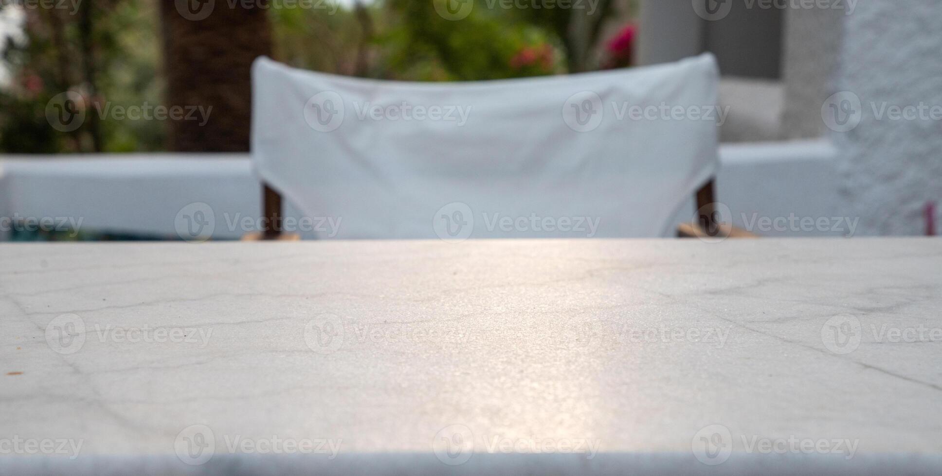 marble tabletop on sunny terrace photo