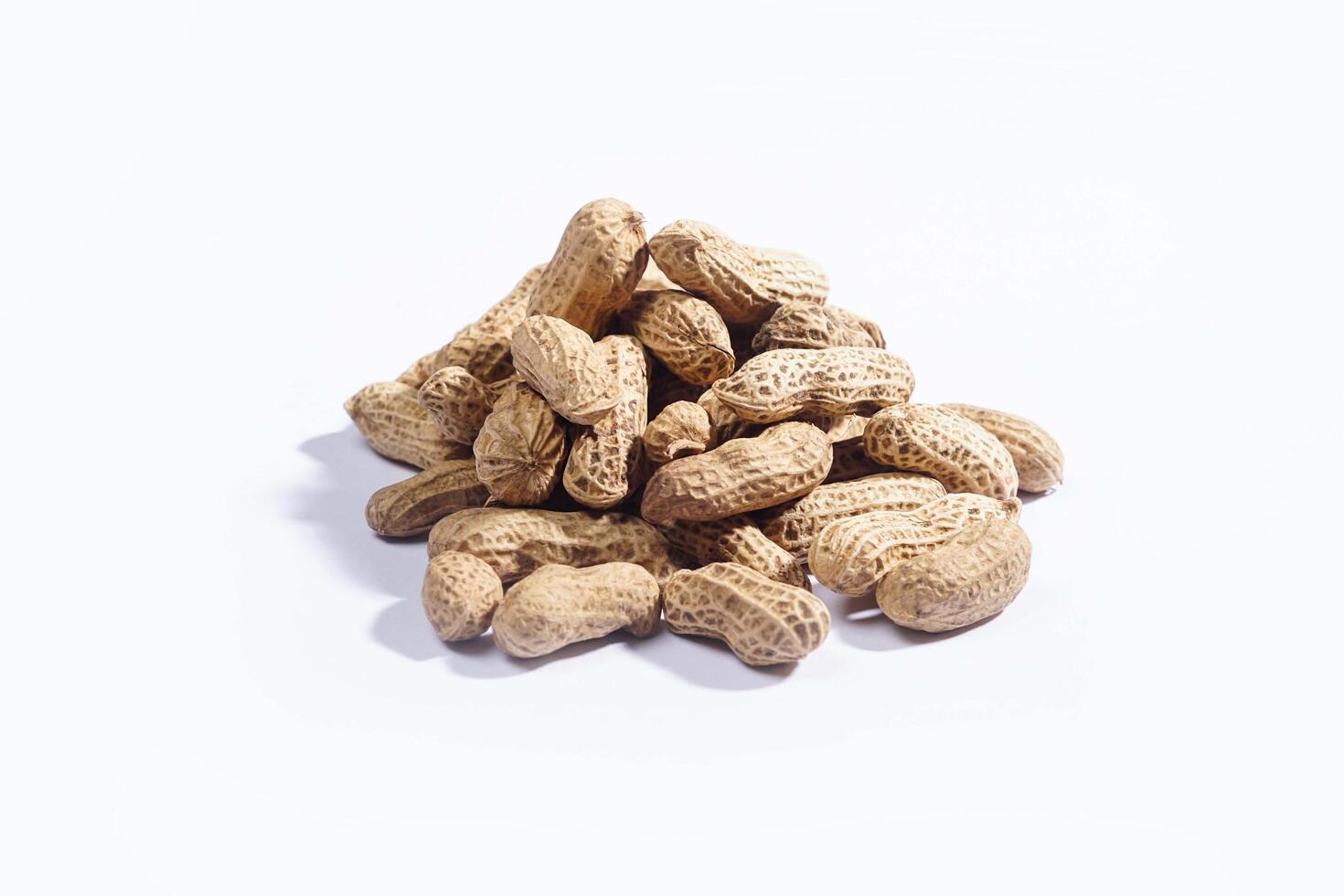 Peanuts on the white background. High resolution photo. photo