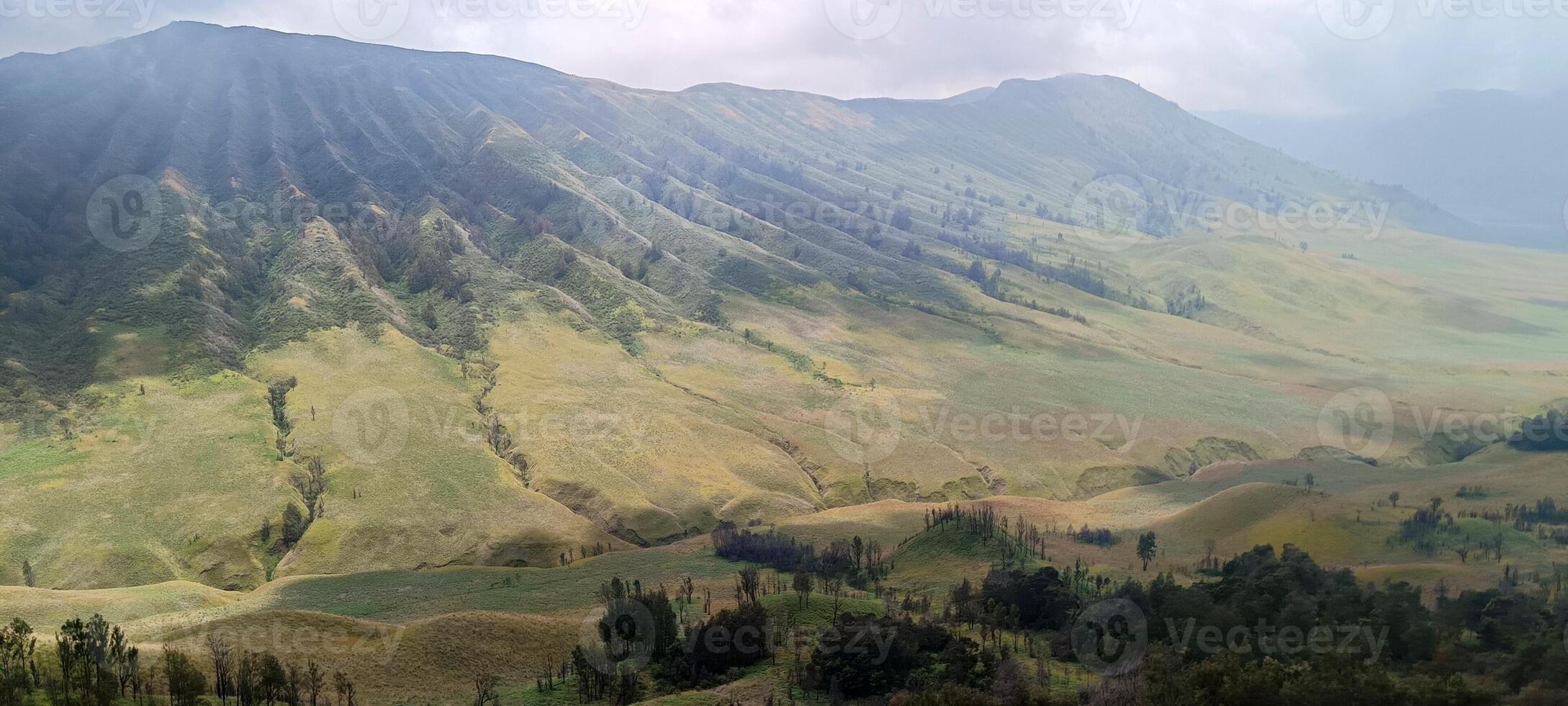 Beautiful view of Mount Bromo and surrounding area in Indonesia photo