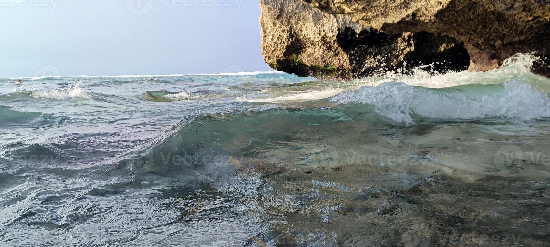 Beautiful view on suluban beach with big rocks in bali photo