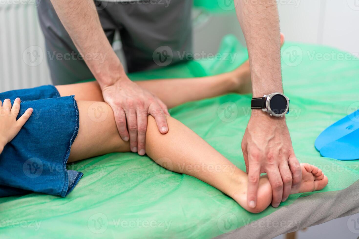 Orthopedic insole. The orthopedist works with the patient. Orthopedic clinic. Choice of insoles in an orthopedic clinic. The orthopedist offers the insole to the patient Foot care photo