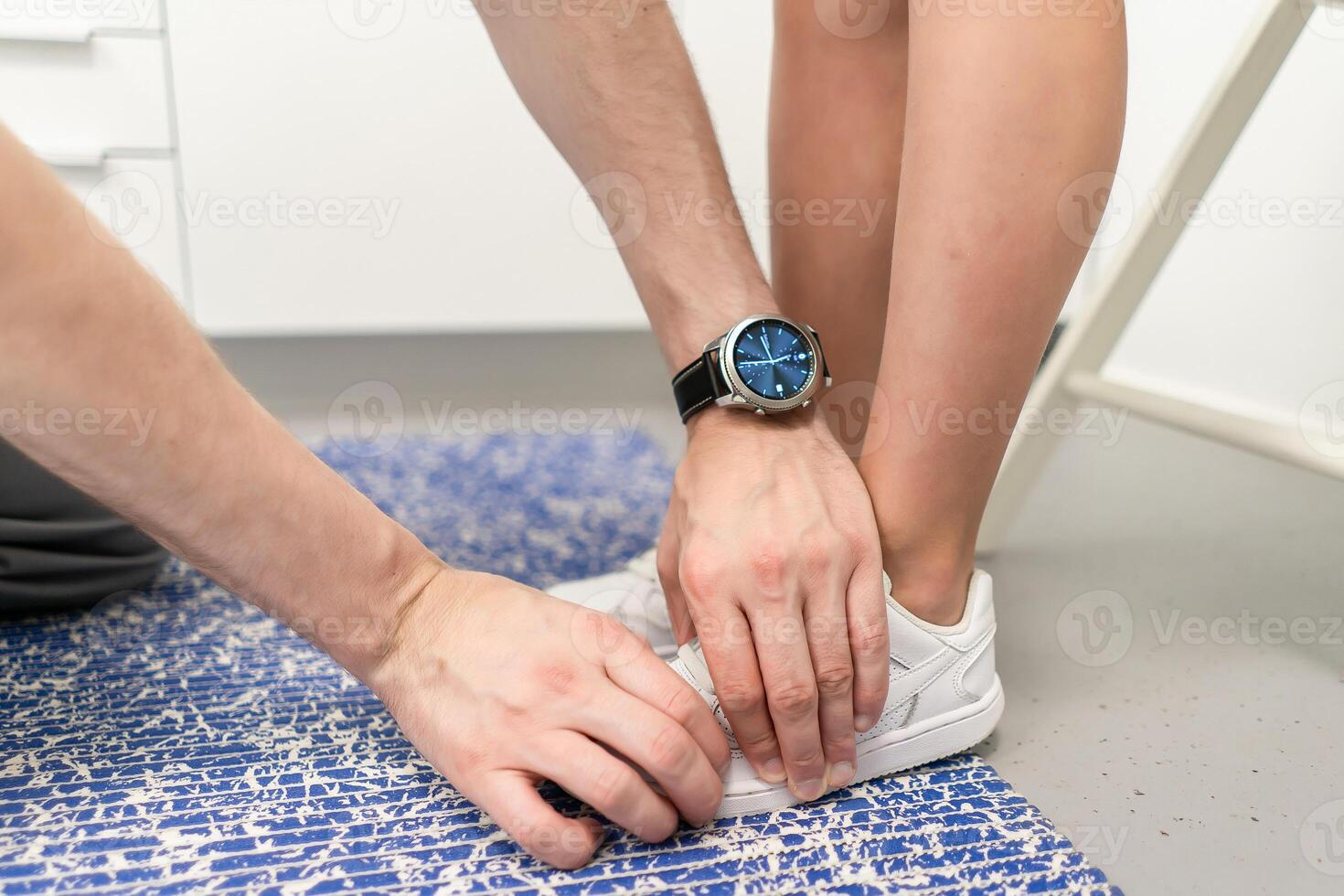 Orthopedic insole. The orthopedist works with the patient. Orthopedic clinic. Choice of insoles in an orthopedic clinic. The orthopedist offers the insole to the patient Foot care photo