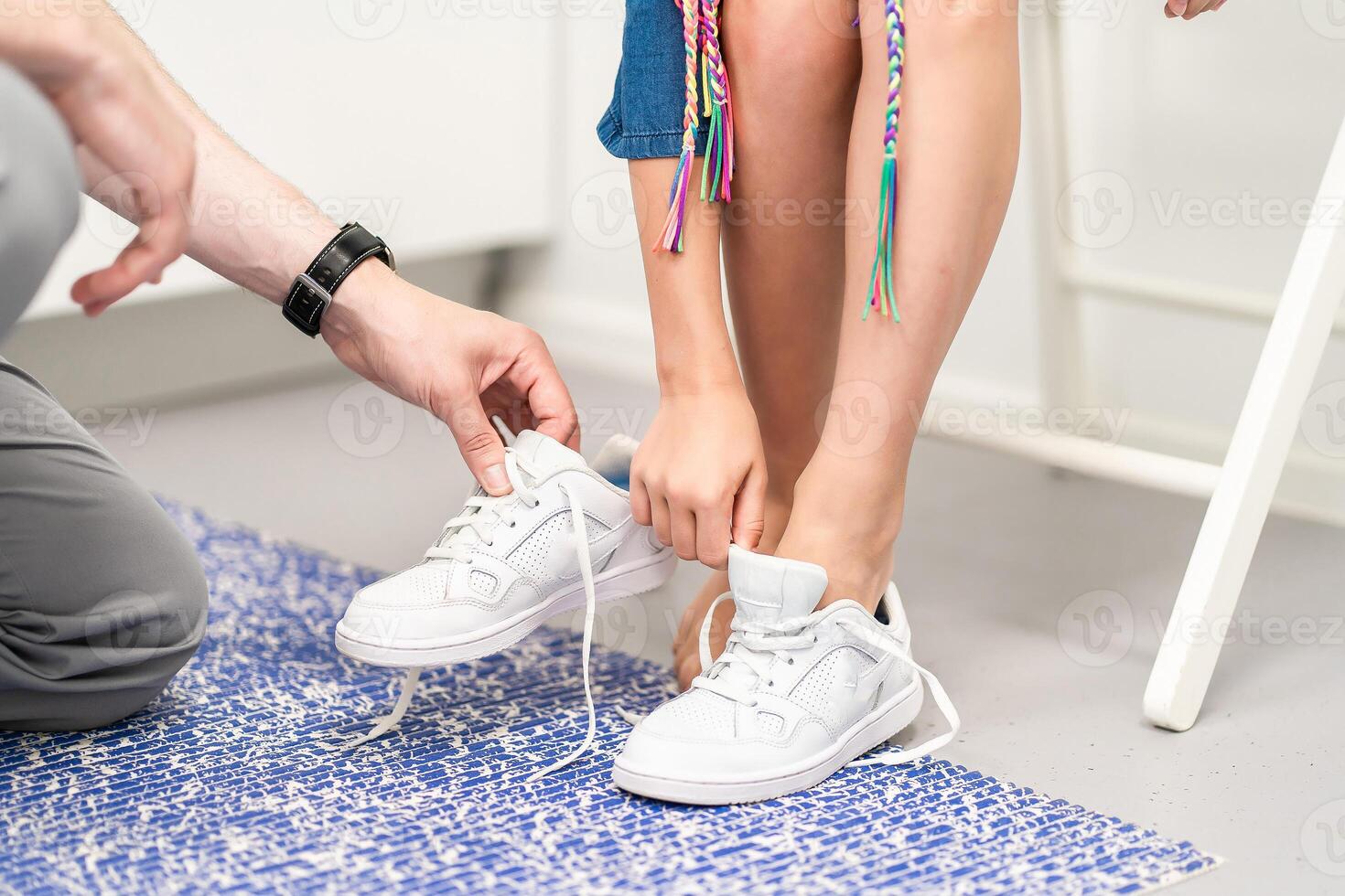 Orthopedic insole. The orthopedist works with the patient. Orthopedic clinic. Choice of insoles in an orthopedic clinic. The orthopedist offers the insole to the patient Foot care photo