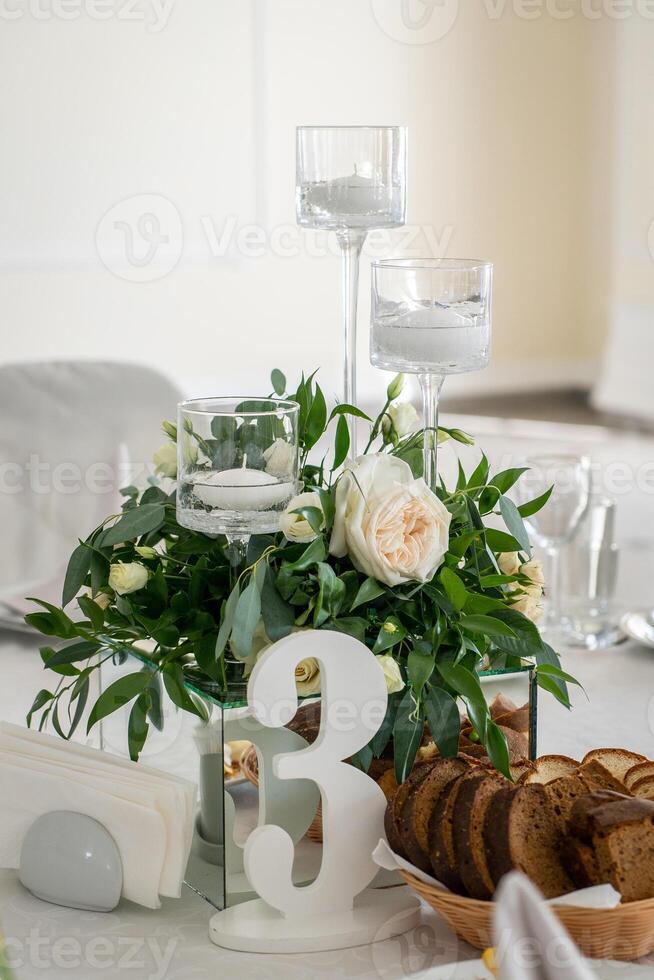 Wedding interior restaurant flowers, blossom floral decorations, white bloom for wedding ceremony photo