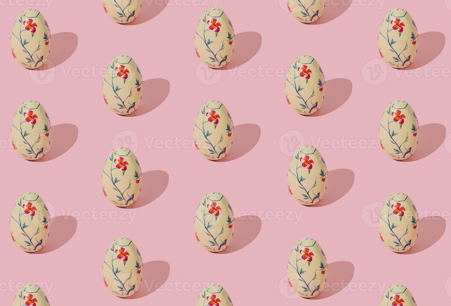 Easter pattern composition made with floral vintage Easter eggs on light pink background. Minimal Easter concept. Creative festive holiday layout. Spring pattern backdrop. photo