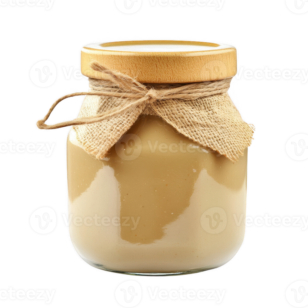 A jar of creamy nut butter, elegantly packaged with a rustic touch. png