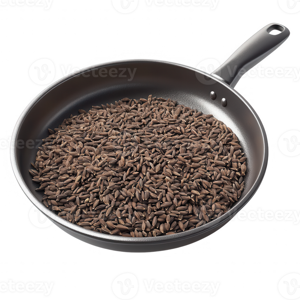 A close-up of a frying pan filled with aromatic cumin seeds ready for cooking. png