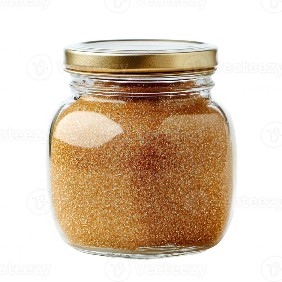 A clear glass jar filled with granulated brown sugar, featuring a gold lid. png