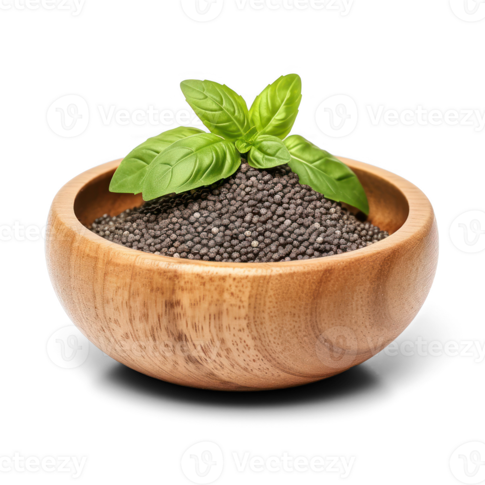 Basil seeds in wooden bowl isolated on transparent background png