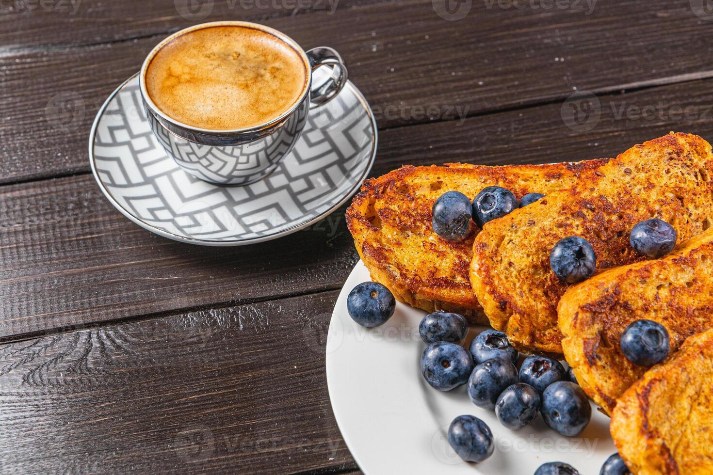 french toast on white plate for breakfast photo
