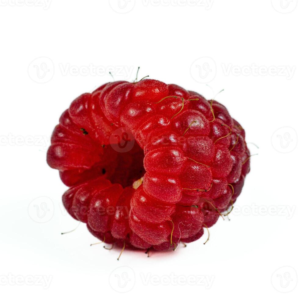 Close up of ripe raspberry on white background macro photo
