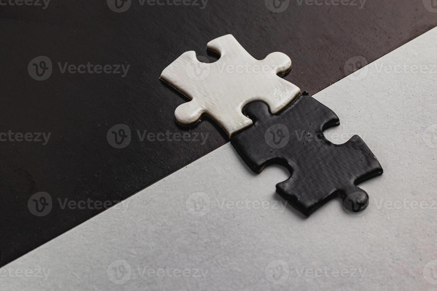 Opposite day concept,white and black puzzle pieces with oposite background color photo